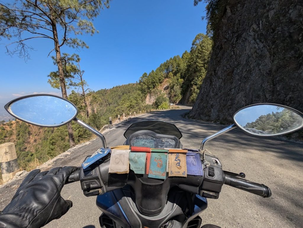 front-view-of-motorcycle-on-scenic-mountain-road-33483759