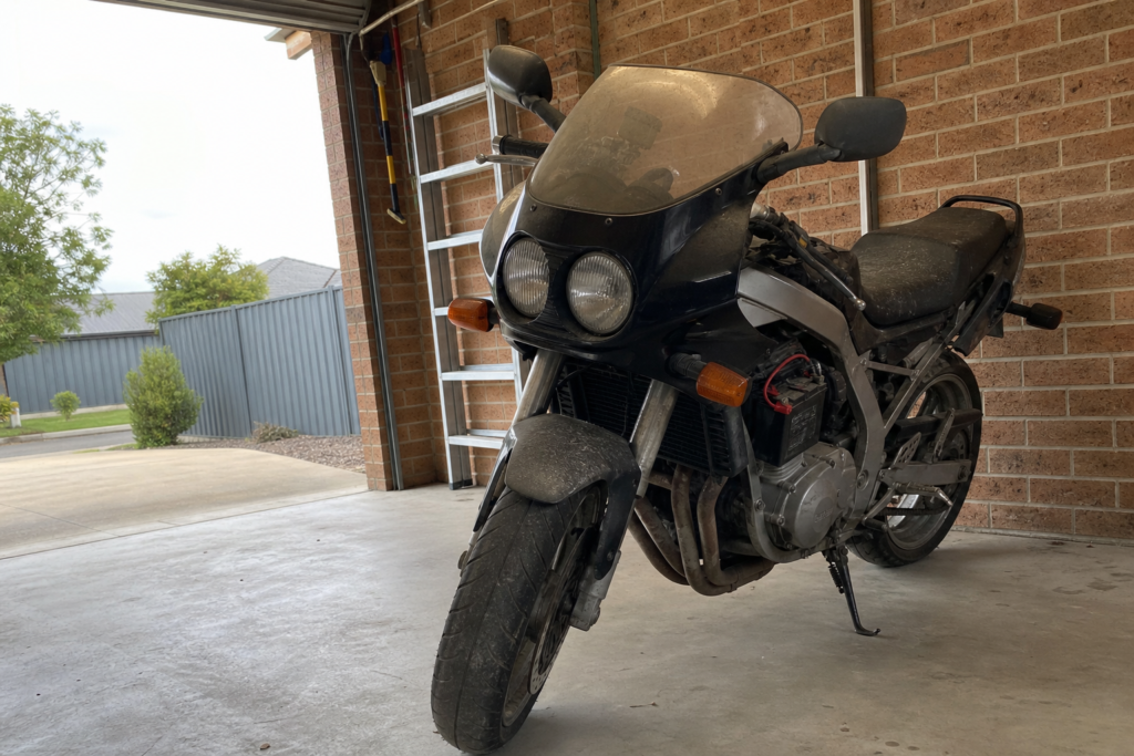 Non-running motorcycle in a Ballarat garage ready for assessment